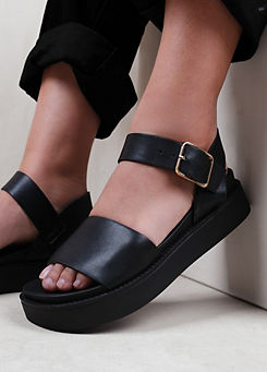 Where’s That From Phoenix Black Buckle Flat Sandals